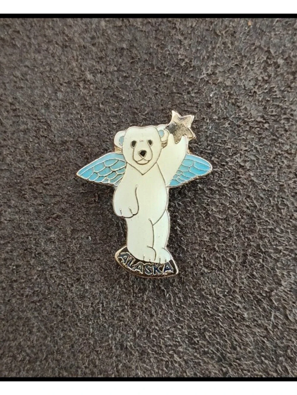 1980s Alaskan Polar Bear Guardian Angel Gold Tone Enamel Pin.